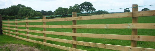 Wooden post and rail fence. Fencing contractors Auckland.