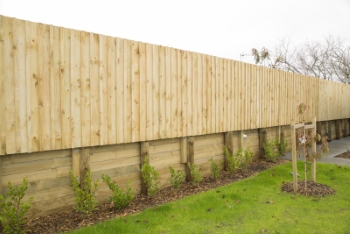 Wooden retaining wall example from Auckland Fences.