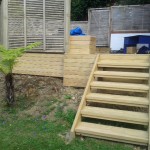 Deck with steps and trellis fence