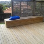 Deck with seat and trellis fence Deck with seat and trellis fence