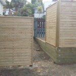 Trellis fence on retaining wall 2 Trellis fence on retaining wall 2