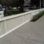 White picket fence with blank profile - back view White picket fence with blank profile - back view